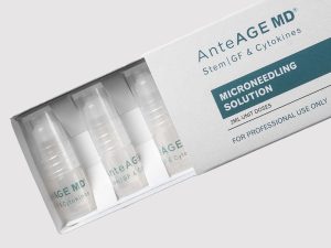 A box of AnteAGE MD Growth Factor Solution half open displaying the vials inside.